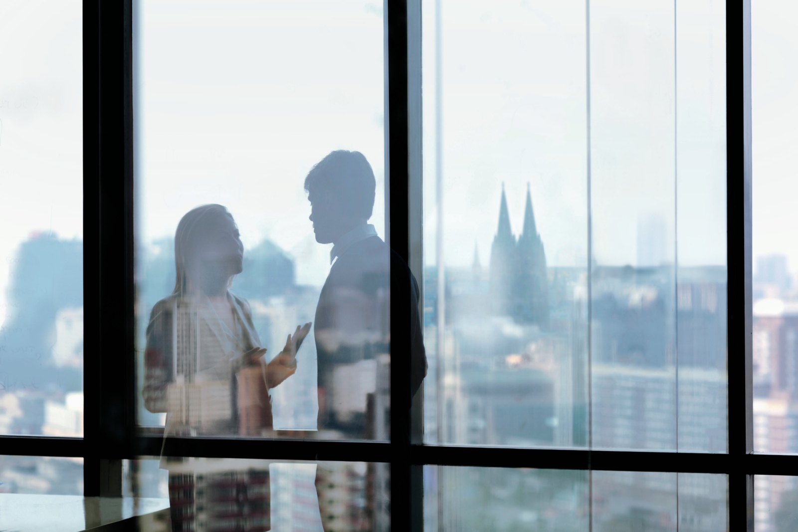 Silhouette shadows of business people talking in office